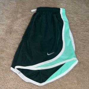 Green Nike shorts